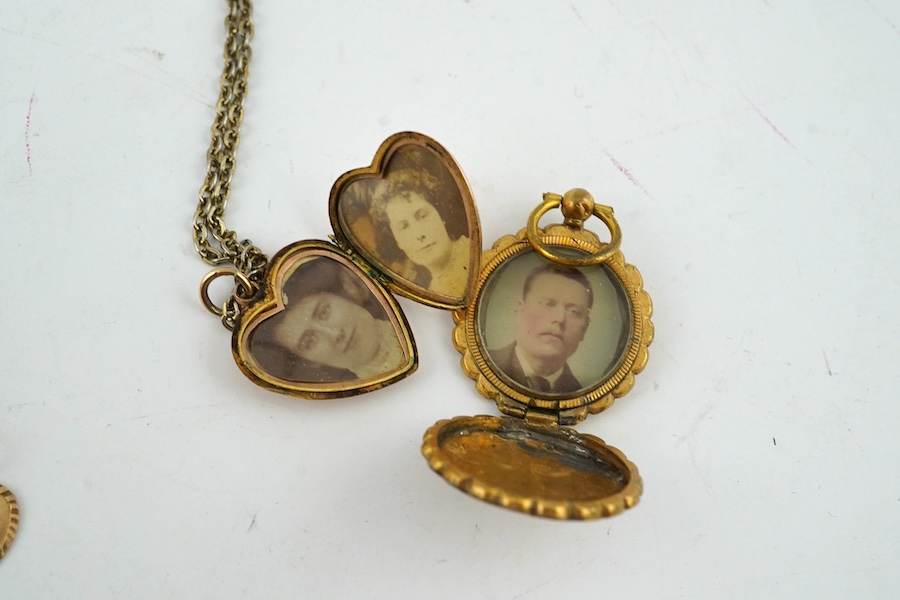 Three assorted yellow metal chains, one stamped 9ct, gross weight 11 grams, a 9ct heart shaped pendant and a small 9ct heart pendant, a yellow metal locket and a 9ct and gem set ring. Condition - poor